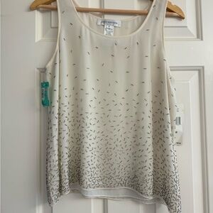 100% silk tank top with beaded details by Jones New York. Off-white, size 10.